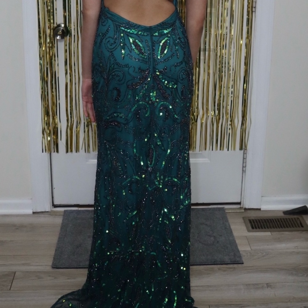 Emerald green prom dress won once. Paid $450 for it.